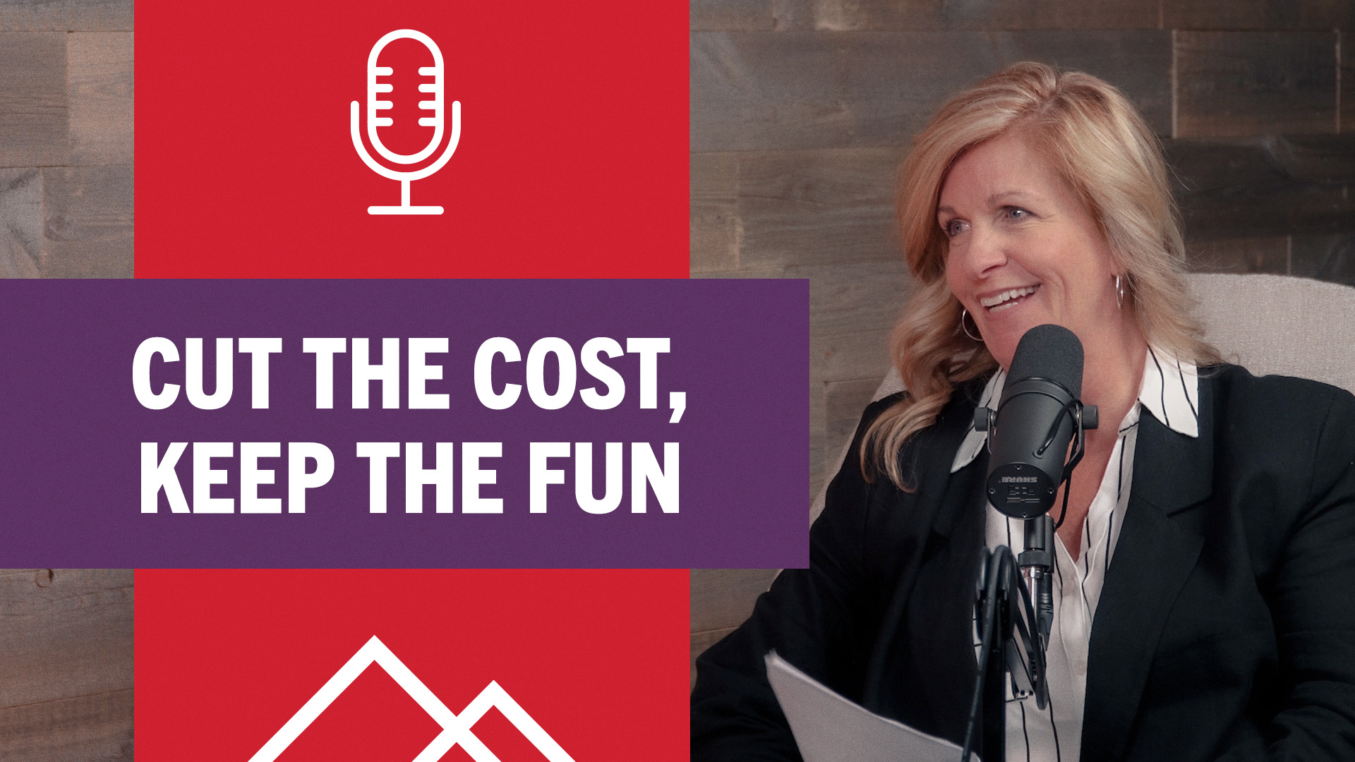 Woman smiling in front of microphone